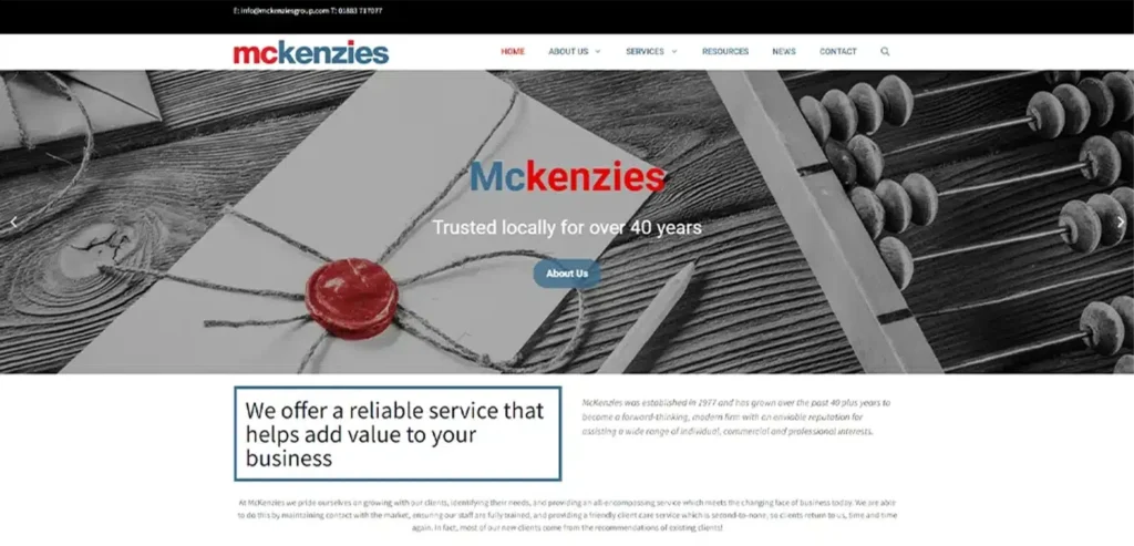 McKenzies Accountants website homepage featuring logo, red wax seal, and wooden background, illustrating professional services and local trust in Oxted.