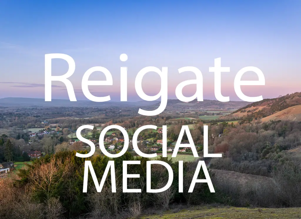Reigate landscape with "Reigate Social Media" text overlay, promoting social media marketing services.